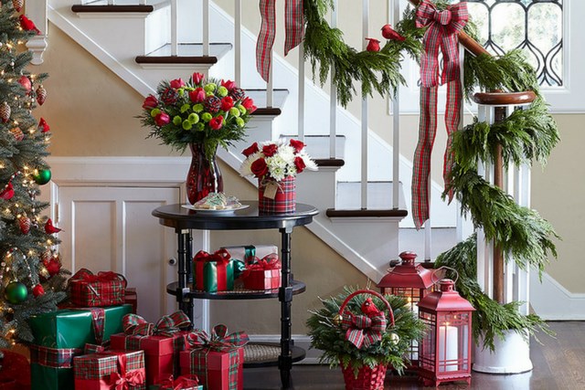 Inside holiday decor up the staircase banister